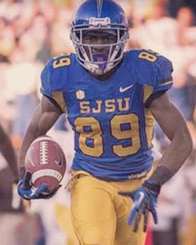 Chandler running with the ball in his San Jose State number 89 football uniform